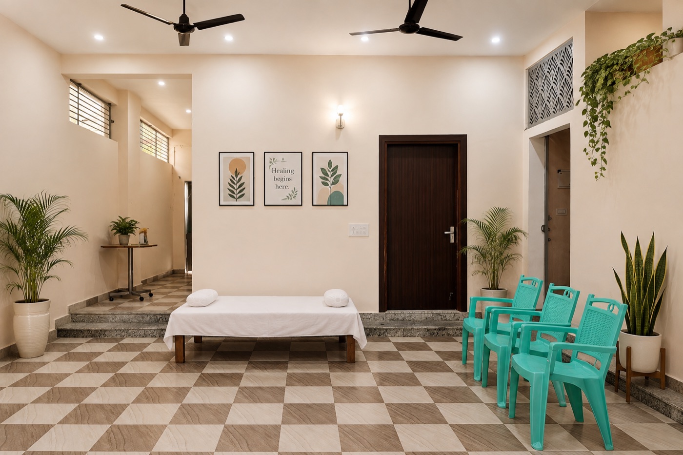 Waiting area at Shriya Clinic with examination couch and seating
